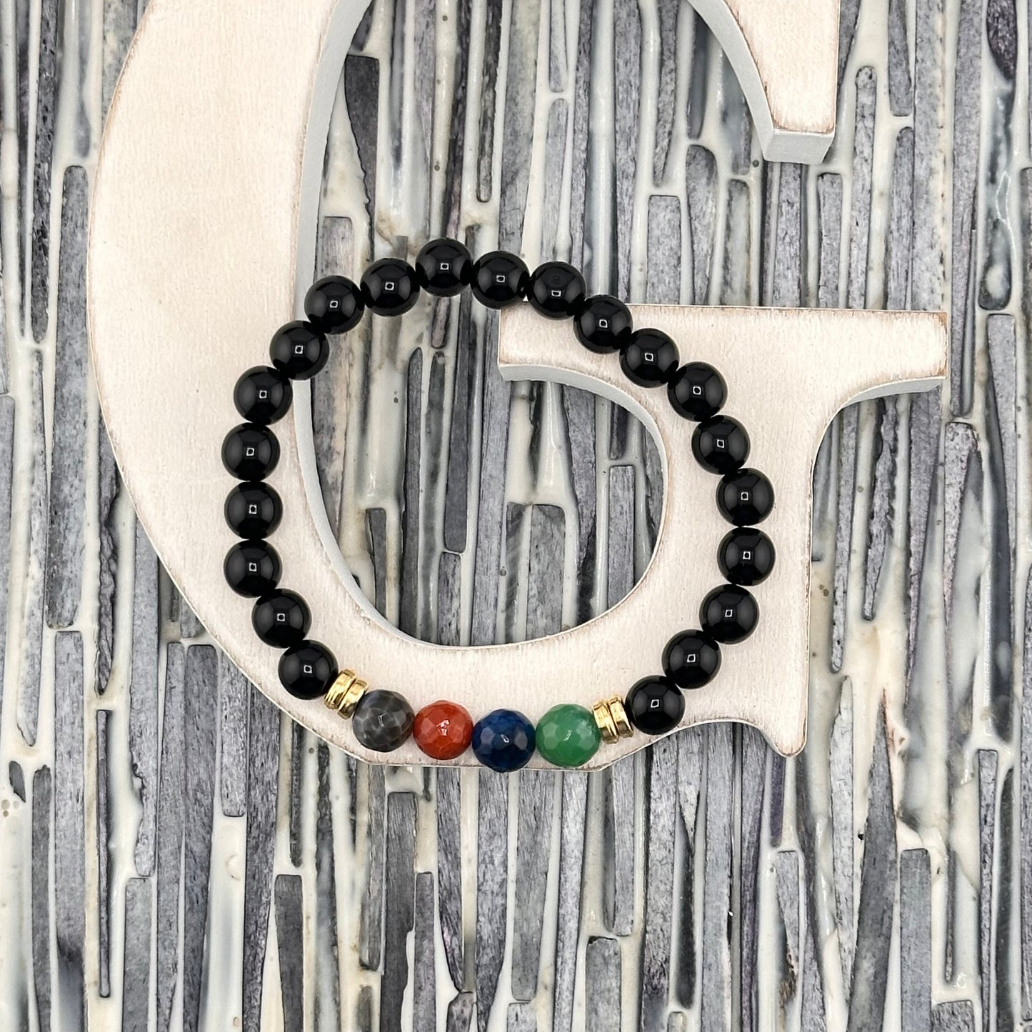 Chakras and Black stones Bracelet